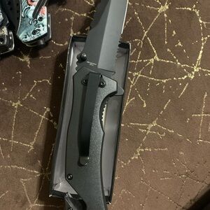 Sleek Black Folding Knife